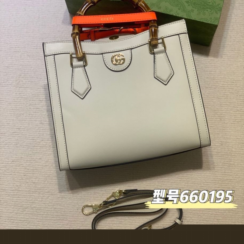G*u*i top handle bags